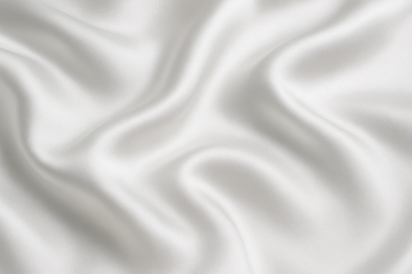 Close-up of 100% mulberry silk fabric from the OpenAir L-Shaped Pillowcase, showing smooth 19 momme texture for skin and hair benefits.