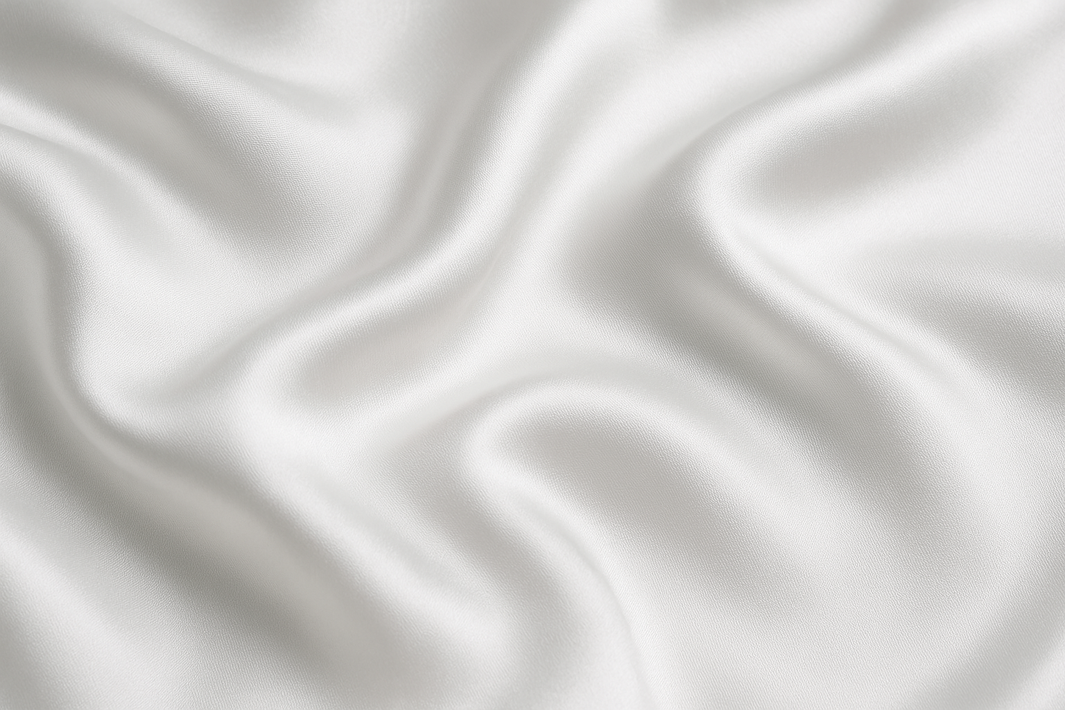 Close-up of 100% mulberry silk fabric from the OpenAir L-Shaped Pillowcase, showing smooth 19 momme texture for skin and hair benefits.