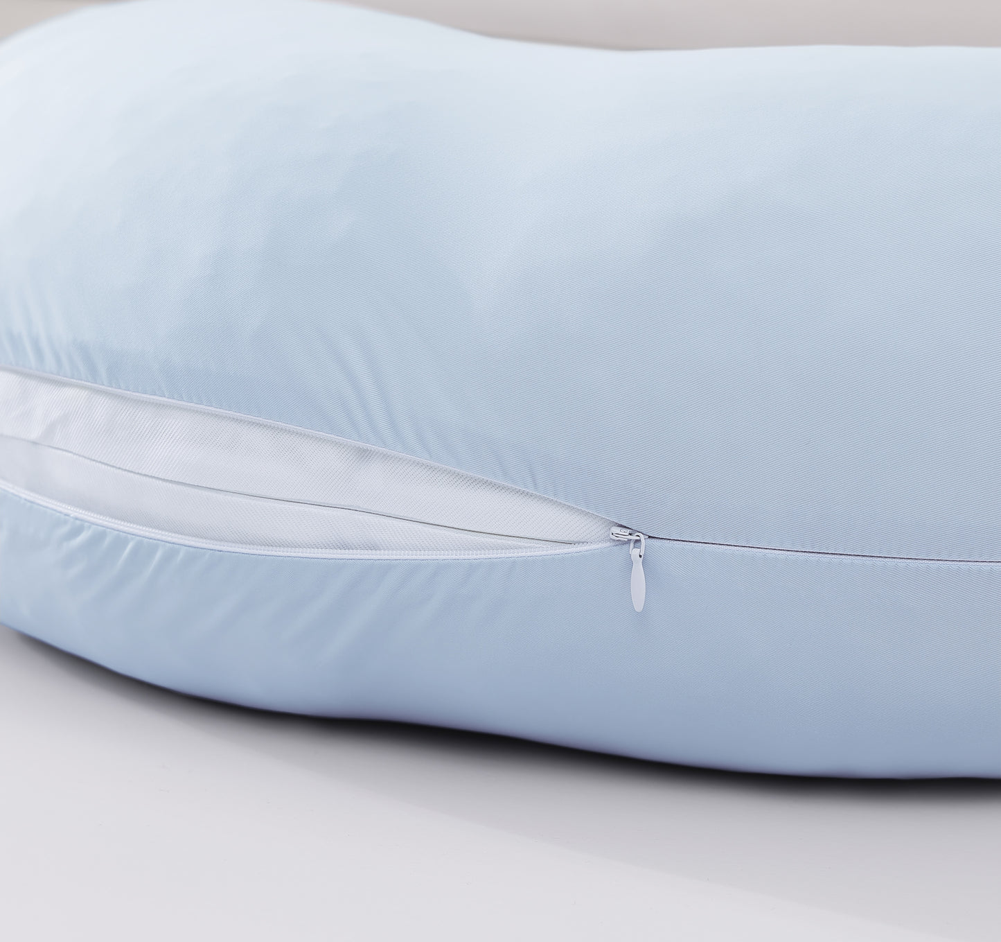 Detail of zipper opening on the OpenAir L-Shaped Cooling Pillowcase in blue, showing easy on-and-off design.