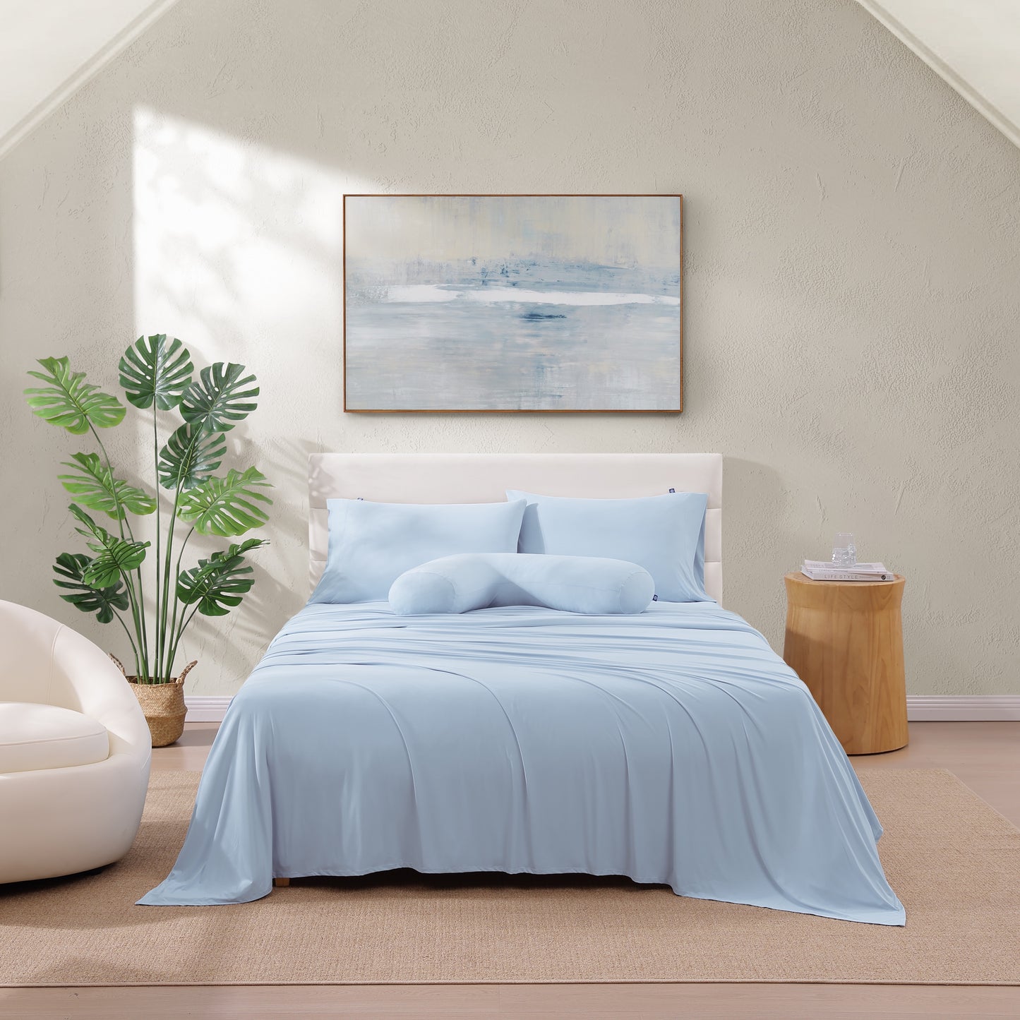 OpenAir Cooling Sheet Set in light blue – queen bed with pillowcases, top sheet, and fitted sheet.