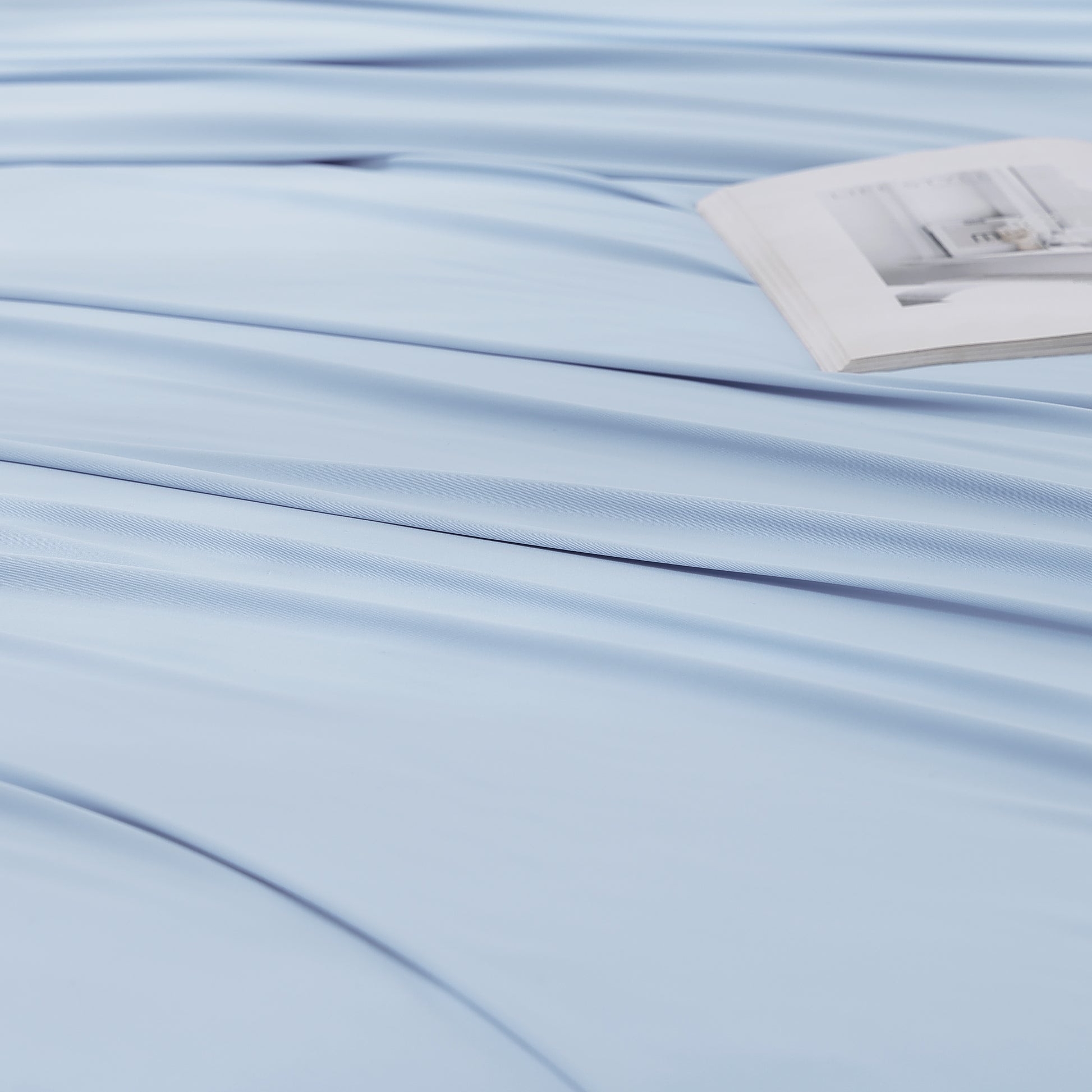 Close-up of blue cooling fabric on the OpenAir L-Shaped Pillowcase, highlighting smooth, breathable texture.